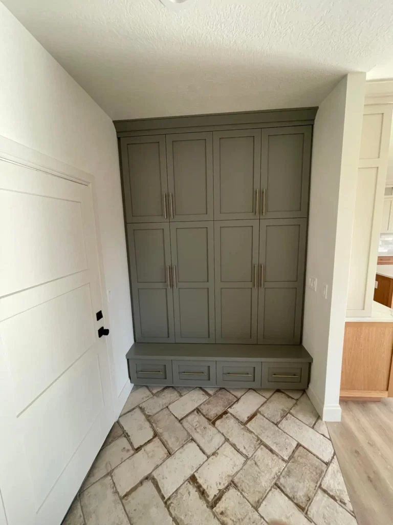 Efficient storage solution with cabinetry in Calgary home.